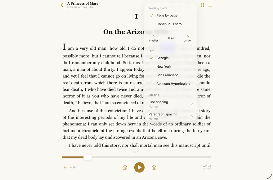 The reading options menu on iPad: page or scroll, text size, Georgia, New York, San Francisco, Atkinson Hyperlegible, line and paragraph spacing